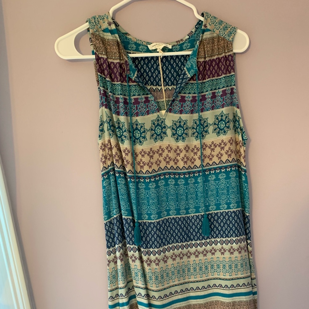 bohemian tasseled dress.